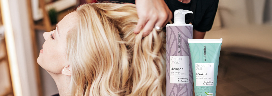 Hairstylist using Wunderbar hair products to clean hair